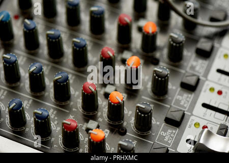 The details of your DJ controller, close. Macro in the dark, with lights.Nightlife Stock Photo