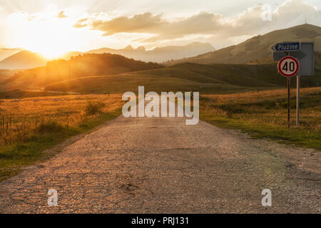 Sunset on the road to Durmitor National Park in Montenegro. Stock Photo