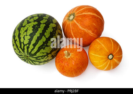 Watermelon and three pumpkins on a white background Stock Photo