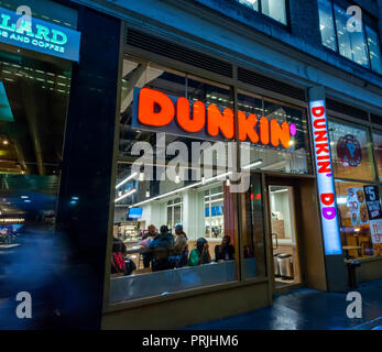 A Dunkin' Donuts franchise in Midtown in New York on Tuesday, September 25, 2018. Dunkin' Brands announced that it was removing 'donuts' from it eponymous chain and it will henceforth only be known as 'Dunkin''. Beverage sales account for 60 percent of the company's business but it has no plans to drop doughnuts from its tasty choices. The change officially starts in January 2019.(Â© Richard B. Levine) Stock Photo