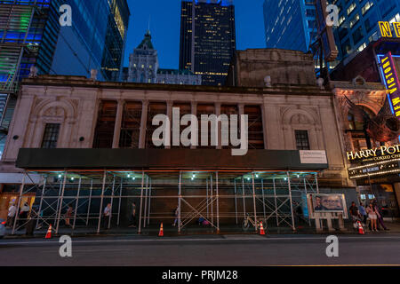 The long vacant scaffolded Times Square Theater on West 42nd Street is seen on Tuesday, September 18, 2018. The Stillman Development International company announced plans to redevelop the 1920 theater for retail use. The theater has been vacant for 30 years as development grew around it. (Â© Richard B. Levine) Stock Photo