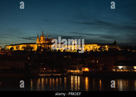Night panoramic view of Prague Castle, St. Vitus Cathedral and Charles Bridge in Prague Stock Photo