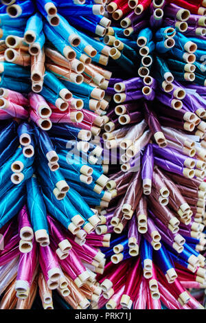 Large number of threads painted in different colors and shades in Morocco. Variety of shades of silk threads for sewing. Fabulous Morocco Stock Photo