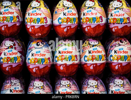 Kinder Surprise in Ukranian store. Kinder Surprise, also known as Kinder Egg or Kinder Surprise Egg, is a candy manufactured by the Italian company Ferrero SpA since 1974. Stock Photo