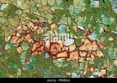 Backgrounds and textures: layers of old cracked paint on rusty metal surface Stock Photo