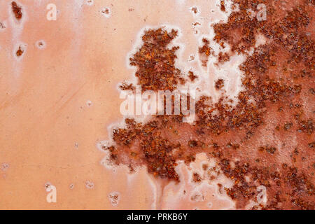 Backgrounds and textures: macro shot of rust on old paint, artistic pattern, industrial or organic abstract Stock Photo