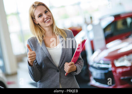 Picture of attractive saleswoman working in company Stock Photo