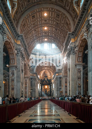 St. Peter's Basilica with tourists, The Vatican, Vatican City. Stock Photo