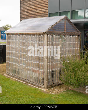 Greenhouse made from recycled plastic bottles at the Campground waste and recycling centre in Wrekenton, Gateshead, England, UK Stock Photo
