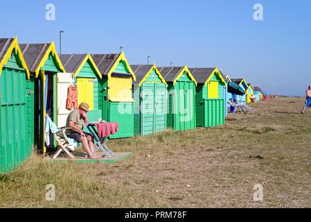 Colourful modern beach huts on the seafront at Littlehampton west Sussex England UK Stock Photo