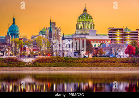 Harrisburg, Pennsylvania, USA downtown skyline on the Susquehanna River at dusk during fall. Stock Photo