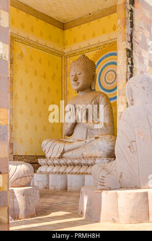 One of the shrines in the Vipassana Dhura Buddhist Meditation Center with statues of monks in Oudong, Cambodia Stock Photo