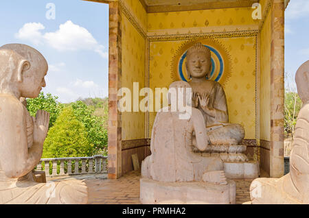 One of the shrines in the Vipassana Dhura Buddhist Meditation Center with statues of monks in Oudong, the old Khmer capital, in Cambodia Stock Photo