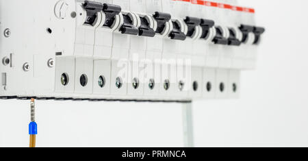 electric machines, switches, isolated on white background, close-up, connect marker cable to the device Stock Photo
