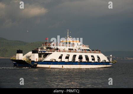 Passenger and vehicle ferry crosses the Dardanelles Strait from Canakkale to Eceabat, in Canakkale, Turkey Stock Photo