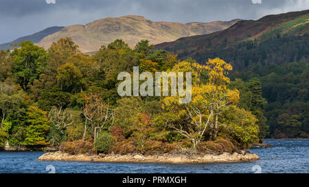 A blustery autumnal day at Loch Katrine the source of much of Glasgows drinking water.The loch is a scenic attraction in the Trossachs area of the Sco Stock Photo