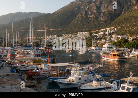 Scenic boat harbour and town on the Mediterranean coast in Kas, Turkey Stock Photo