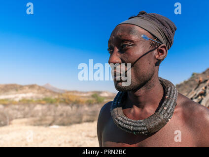 Portrait of a Himba tribe man, Cunene Province, Oncocua, Angola Stock Photo