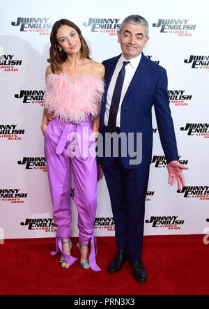 Olga Kurylenko and Rowan Atkinson attending the Johnny English Strikes Again screening held at Curzon Mayfair, London. Stock Photo