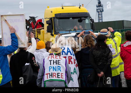 Plumpton, Blackpool, UK. 3rd Oct, 2018. Anti-fracking protester cut free from a lock-on  device after 3 day protest in the entrance to the Cuadrilla exploratorive site on Preston New Road, Little Plumpton, near Blackpool. Several protesters started the protest on Monday in support of the three anti-fracking protesters who were recently jailed and to coincide with the start of the Conservative Party Conference being held in Birmingham. Credit: Dave Ellison/Alamy Live News