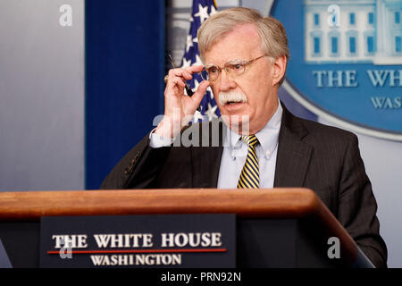 Washington, USA. 3rd Oct, 2018. U.S. National Security Adviser John Bolton speaks at a press briefing at the White House in Washington, DC, the United States, on Oct. 3, 2018. John Bolton said here on Wednesday that the United States is withdrawing from the Optional Protocol to the Vienna Convention on dispute resolution. Credit: Ting Shen/Xinhua/Alamy Live News Stock Photo