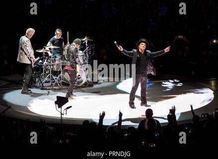 Hamburg, Germany. 03 October 2018, Hamburg: The band U2 with Adam Clayton (l-r), bassist, Larry Mullen junior, drummer, David Howell Evans (The Edge), guitarist, and Paul David Hewson (Bono), vocalist, performs during their 'THE eXPERIENCE + iNNOCENCE' tour at the Barclaycard Arena. Photo: Daniel Bockwoldt/dpa Credit: dpa picture alliance/Alamy Live News Stock Photo