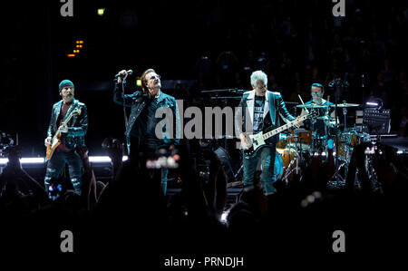 Hamburg, Germany. 03 October 2018, Hamburg: The band U2 with David Howell Evans (The Edge, l-r), guitarist, Paul David Hewson (Bono), vocalist, Adam Clayton, bassist and Larry Mullen junior, drummer, performs during their 'THE eXPERIENCE + iNNOCENCE' tour at the Barclaycard Arena. Photo: Daniel Bockwoldt/dpa Credit: dpa picture alliance/Alamy Live News Stock Photo