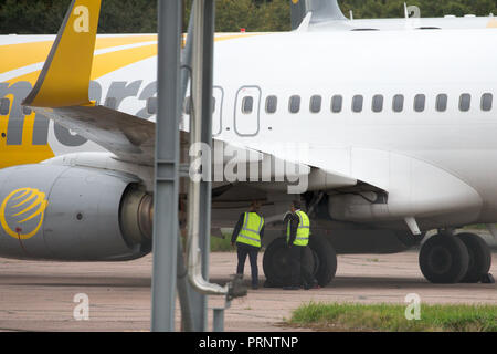 Picture dated October 3rd shows the planes of Primera Air being stored in a corner of Stansted Airport,Essex,after the company collapsed yesterday.    Primera Air ceased all operations at midnight on Monday, after 14 years in business.  The airline, which had 15 planes, began offering long-haul flights from UK airports, including Stansted and Birmingham, earlier this year.  The UK's Civil Aviation Authority has told passengers who have travelled abroad on a Primera flight that they must now make their own arrangements to return to the U Stock Photo