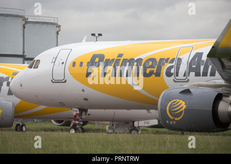 Picture dated October 3rd shows the planes of Primera Air being stored in a corner of Stansted Airport,Essex,after the company collapsed yesterday.    Primera Air ceased all operations at midnight on Monday, after 14 years in business.  The airline, which had 15 planes, began offering long-haul flights from UK airports, including Stansted and Birmingham, earlier this year.  The UK's Civil Aviation Authority has told passengers who have travelled abroad on a Primera flight that they must now make their own arrangements to return to the U Stock Photo