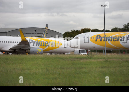 Picture dated October 3rd shows the planes of Primera Air being stored in a corner of Stansted Airport,Essex,after the company collapsed yesterday.    Primera Air ceased all operations at midnight on Monday, after 14 years in business.  The airline, which had 15 planes, began offering long-haul flights from UK airports, including Stansted and Birmingham, earlier this year.  The UK's Civil Aviation Authority has told passengers who have travelled abroad on a Primera flight that they must now make their own arrangements to return to the U Stock Photo