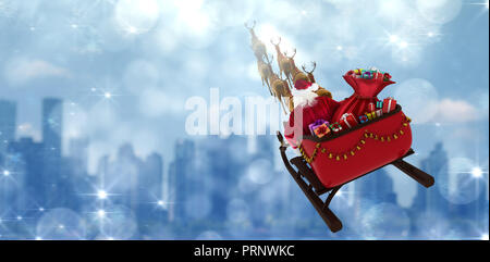 Composite image of high angle view of santa claus riding on sled during christmas Stock Photo
