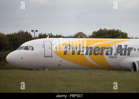 Picture dated October 3rd shows the planes of Primera Air being stored in a corner of Stansted Airport,Essex,after the company collapsed yesterday.    Primera Air ceased all operations at midnight on Monday, after 14 years in business.  The airline, which had 15 planes, began offering long-haul flights from UK airports, including Stansted and Birmingham, earlier this year.  The UK's Civil Aviation Authority has told passengers who have travelled abroad on a Primera flight that they must now make their own arrangements to return to the U Stock Photo