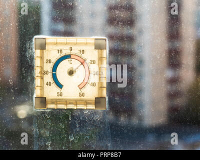 outdoor thermometer behind the window Stock Photo - Alamy