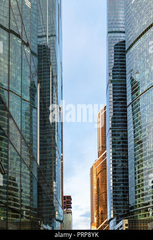 glass walls of skyscrapers in business district of Moscow city in autumn evening Stock Photo