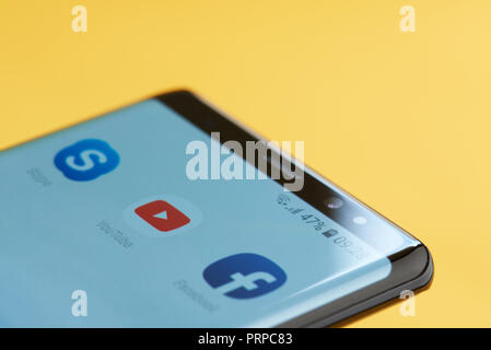 New york, USA - october 3, 2018: Youtube icon on smartphone screen close up view with yellow background Stock Photo