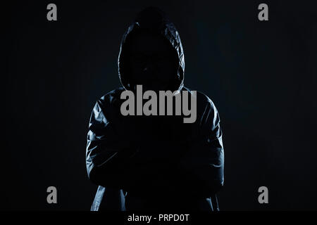 Unrecognizable hacker portrait, security and technology crime concept . Stock Photo