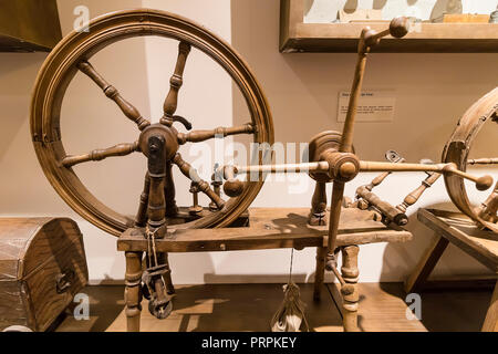 Alba de Tomes, Salamanca, Spain - October 7, 2017: Spinning wheel in The Discalced Carmelites museum (Carmelitas descalzas). Stock Photo