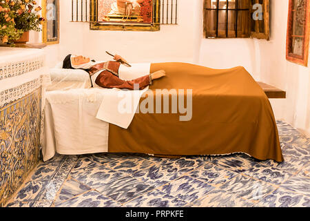 Alba de Tomes, Salamanca, Spain - October 7, 2017: Representation of the death of St. Teresa of Avila (Santa Teresa de Jesus) in her own room in conve Stock Photo