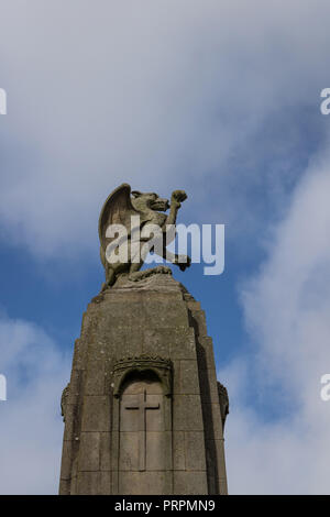 Detail of a cenotaph with a rampant Welsh dragon in Caernarfon, Gwynedd, North Wales, UK Stock Photo