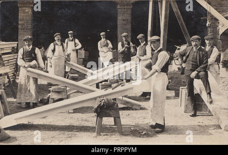 * Vintage Photograph Showing a Large Group of Male Construction Workers on a Building Site Stock Photo