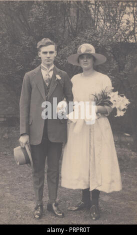 * Vintage Photograph of a Young Couple. Possibly Bride and Groom or Part of a Wedding Party. Stock Photo
