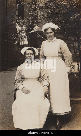 * Vintage Photograph of Two Female Edwardian Domestic Servants Stock Photo
