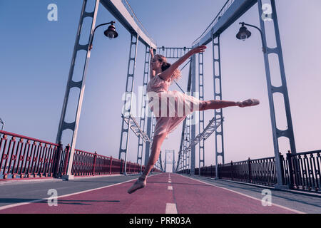 Nice pleasant woman being involved in dance Stock Photo