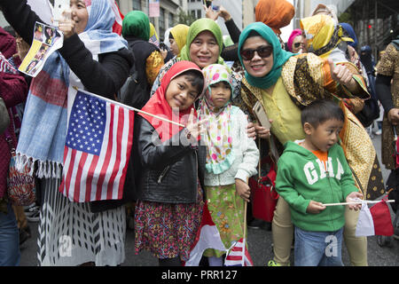 Indonesian American Muslim children march in the American Muslim Day Parade on Madison Avenue in New York City. Stock Photo