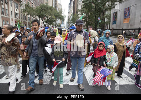 Indonesian American Muslim community marches in the American Muslim Day Parade on Madison Avcenue in New York City. Stock Photo