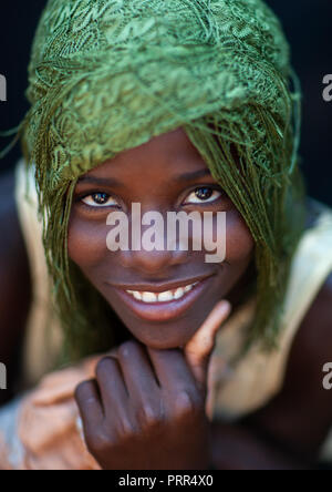 Portrait of a smiling Mudimba  tribe girl, Cunene Province, Cahama, Angola Stock Photo