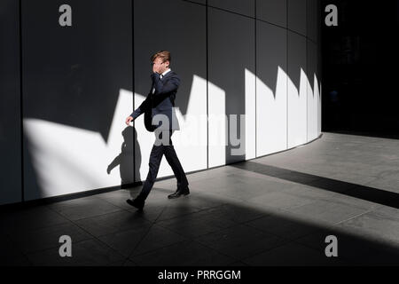 England,London,The City of London- young businessman on his way to the office Stock Photo