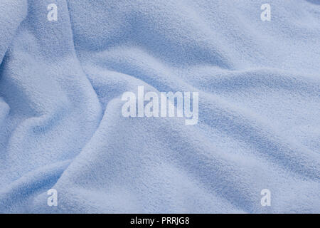 Abstract texture of a fleecy fabr. Blue fabric,  towel background. Stock Photo