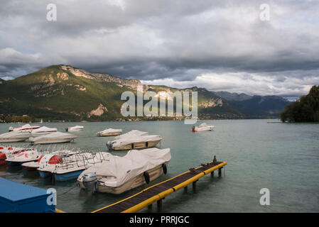 Lake Annecy is fed by mountain springs and known for its clean water ...