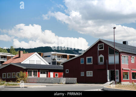 beautiful buildings under cloudy blue sky in Lillehammer, Oppland, Norway Stock Photo